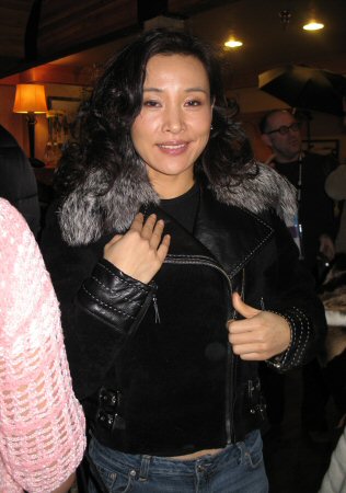 Joan Chen wearing Black Velour Shearling Jacket with Fox Collar Model 406B