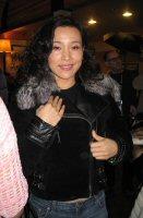 Joan Chen wearing Black Velour Shearling Jacket with Fox Collar Model 406B