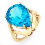 Fashionable Ring With 9.50ctw Genuine Topaz Set In 10K Yellow Gold