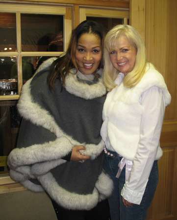 Kym Whitley wearing Grey Cashmere Cape with Fox Trim Model 27G SOLD OUT