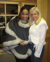 Kym Whitley wearing Grey Cashmere Cape with Fox Trim Model 27G SOLD OUT