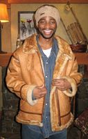 Ryan Bantu wearing Rust Colored Shearling Bomber Model 192